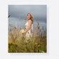Portrait canvas print of a bride standing in a wildflower meadow